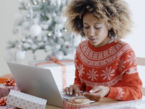 Woman shopping online during the festive season. 